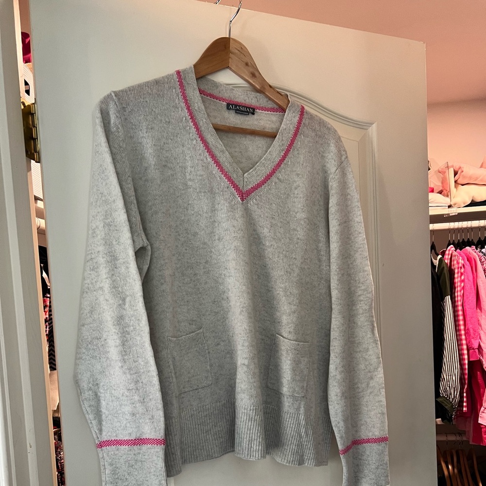 100 % Cashmere gray sweater with pink accents. Only worn  twice